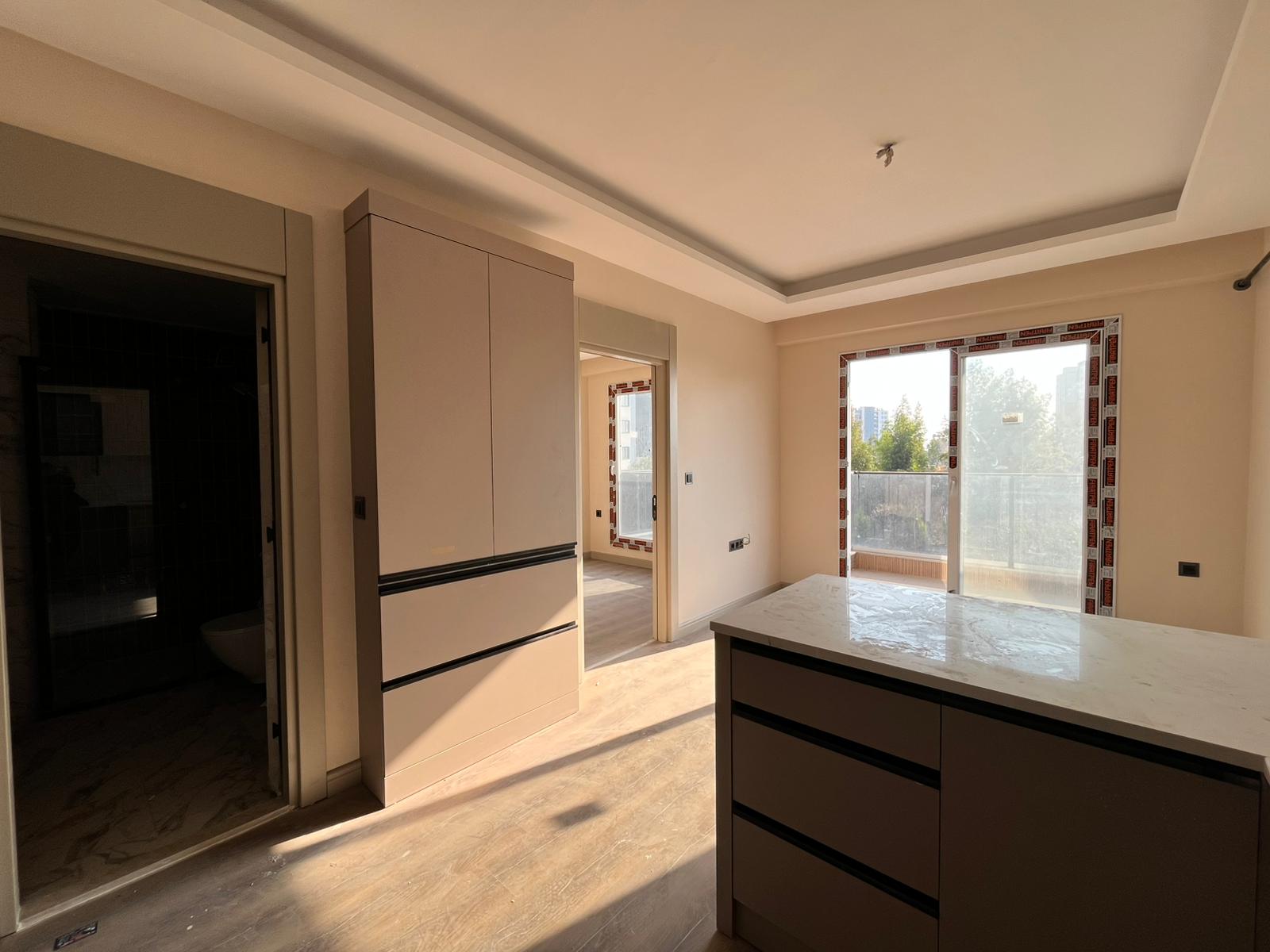 Современная квартира 1+1 в Мерсине (Томюк) в 200м от моря