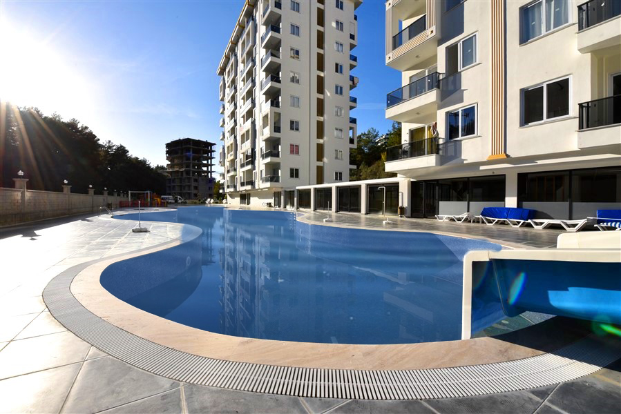 Современные апартаменты в Авсалларе с отельной инфраструктурой