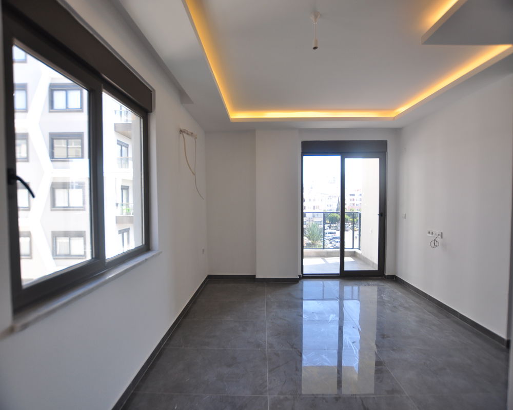 Moderni asunto myynnissä Mahmutlarissa, Alanyassa – Puutarhan ja palveluiden äärellä