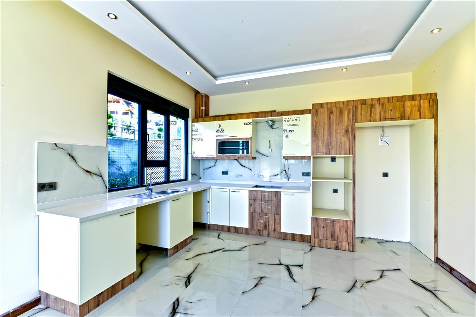Spacious Modern Apartment for Sale in Hasbahce Alanya with Extensive Facilities