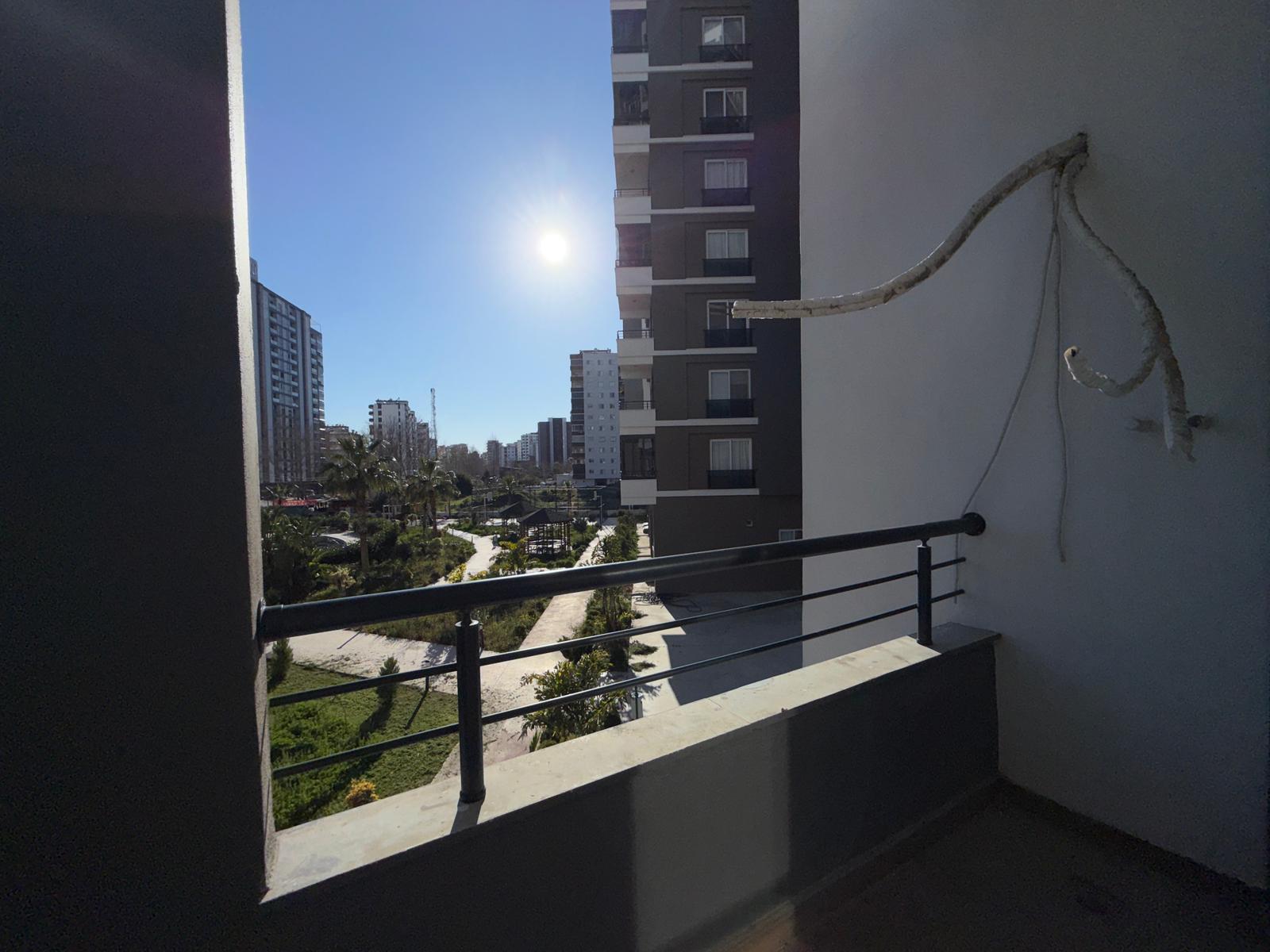 Moderne 1+1 lejlighed til salg i Mersin Tomuk nær havet