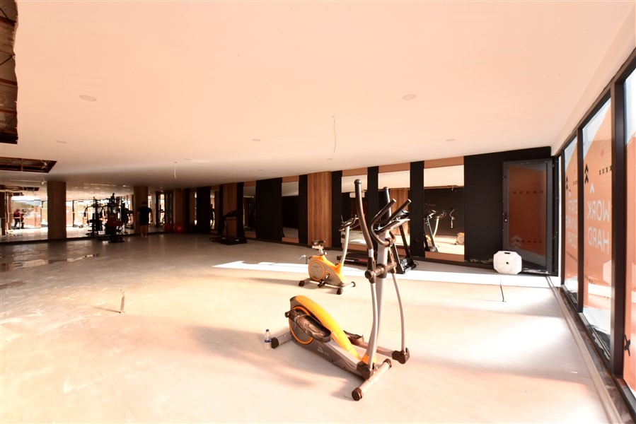 Современные апартаменты в Авсалларе с отельной инфраструктурой