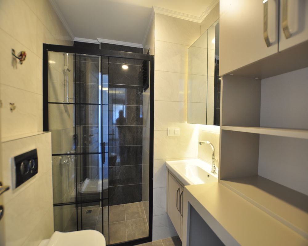 Moderni asunto myynnissä Mahmutlarissa, Alanyassa – Puutarhan ja palveluiden äärellä